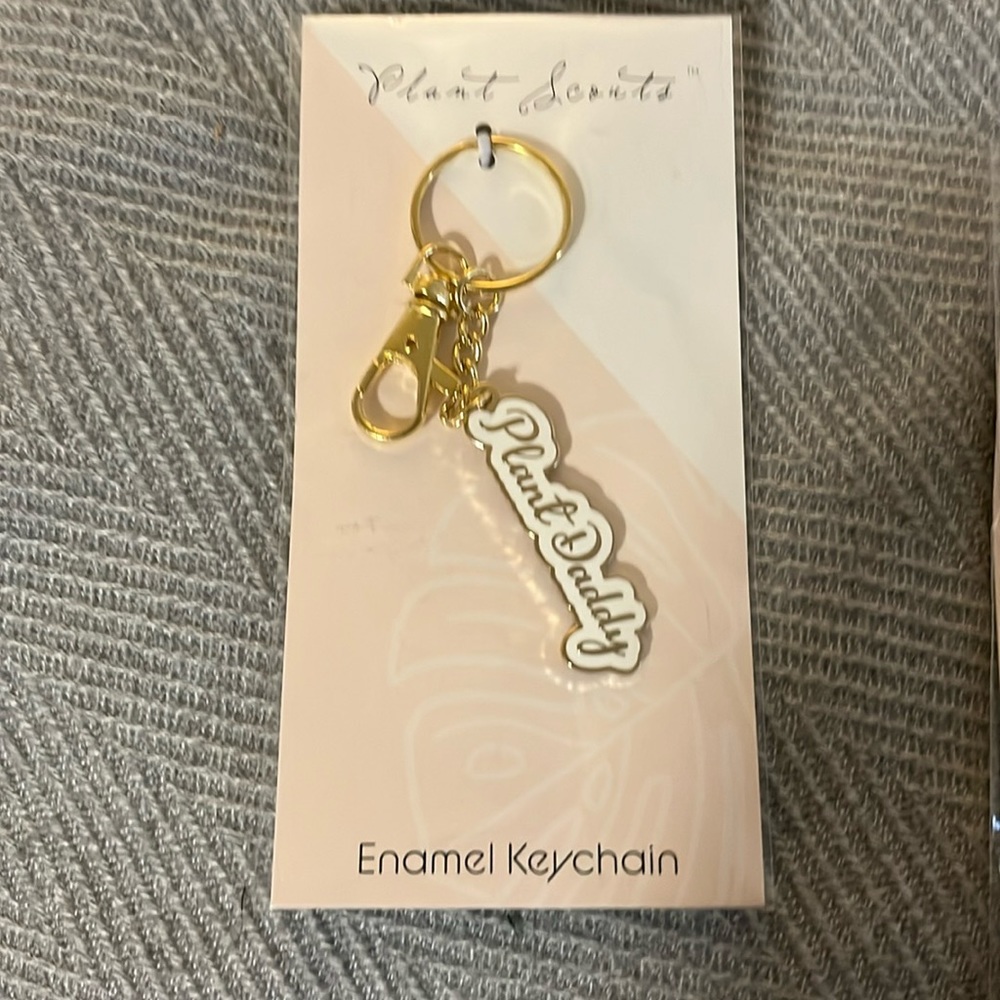 NWT “plant daddy” Super cute key chain with extra claps.